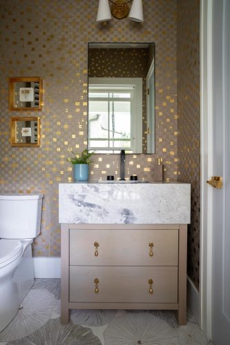 Harrier St gold accented tile bathroom