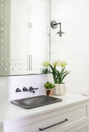 Golf Course Drive bathroom with mirrored cabinets